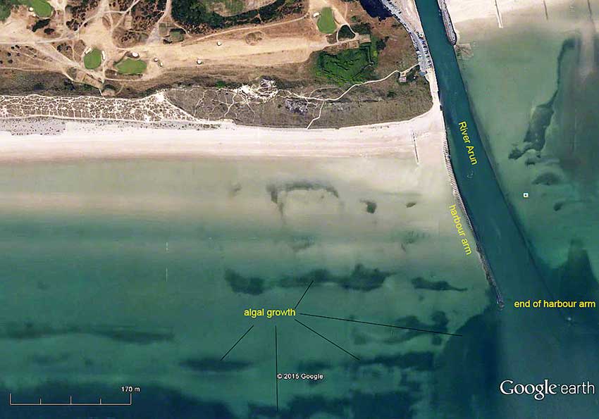 Aerial view of Littlehampton West Beach with harbour arm.