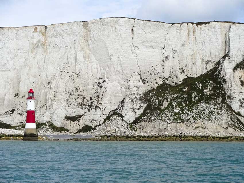 Beachy Head lighthouse and chalk cliffs.