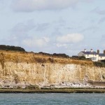 Watchful Cuckmere coastguard cottages.