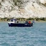 Watchful fishing boat near Beachy head